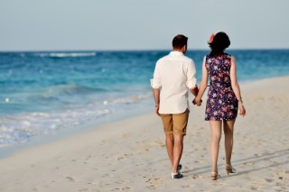 Rachel_and_i_honeymoon_beach_walking_away