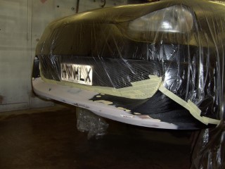 Car_being_fixed_masked_front_right