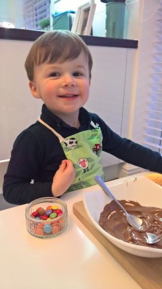 Chocolate_topping_ethan_making_cakes_march_2019