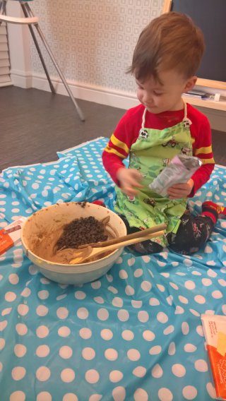 Ethan Adding Chocolate Chips Baking Santas Cookies Christmas Eve 2018