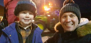 Ethan_and_i_dark_lutterworth_tractor_parade_dec_2020