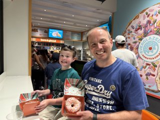 Ethan_and_i_everglazed_donuts_day_9_disney_world_july_2025