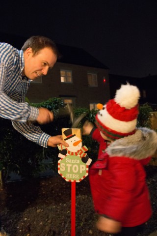 Ethan_and_i_hammering_putting_the_christmas_tree_up_december_2017
