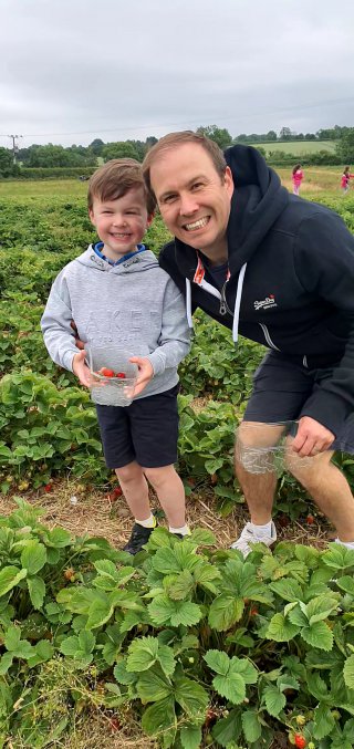 Ethan_and_i_strawberry_picking_whetstone_pastures_farm_june_2021