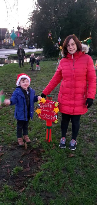 Ethan_and_joy_cosby_christmas_knitting_bomb_dec_2020