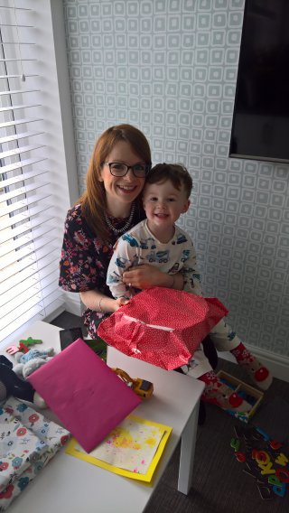 Ethan_and_rachel_opening_presents_mothers_day_may_2019