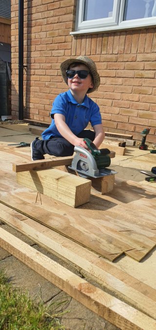 Ethan Cutting Building Bird House April 2020