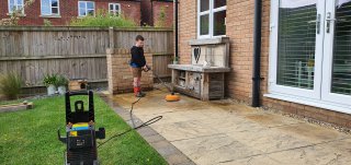 Ethan_jetwashing_garden_june_2022