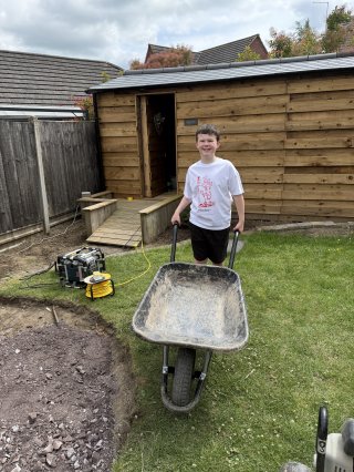 Ethan Wheelbarrow Garden Progress Base June 2026