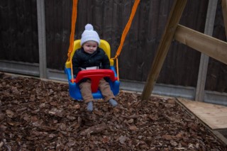 Ethans_1st_birthday_november_2016_ethan_on_the_swing