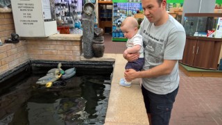 Garden_center_july_2016_ethan_and_i_fish_pond