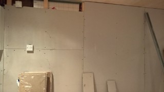 Insulating_and_plasterboarding_the_garage_house_wall