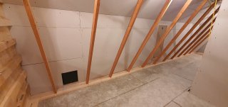 Long_wall_plasterboarding_loft_may_2021