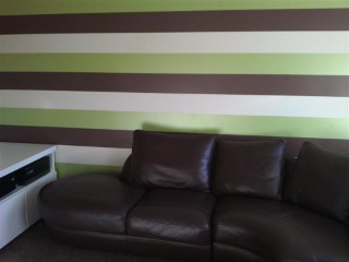 Lounge Striped Wallpaper With Sofa In