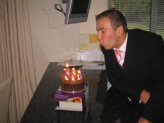 Me_blowing_out_candles_on_my_birthday_2006