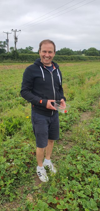 Me_strawberry_picking_whetstone_pastures_farm_june_2021