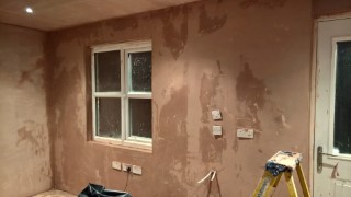 Plastering_the_garage_back_wall_february_2016