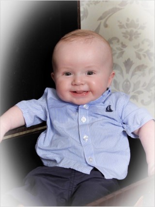 Playgroup_photos_may_2016_ethan_sitting_in_a_suitcase