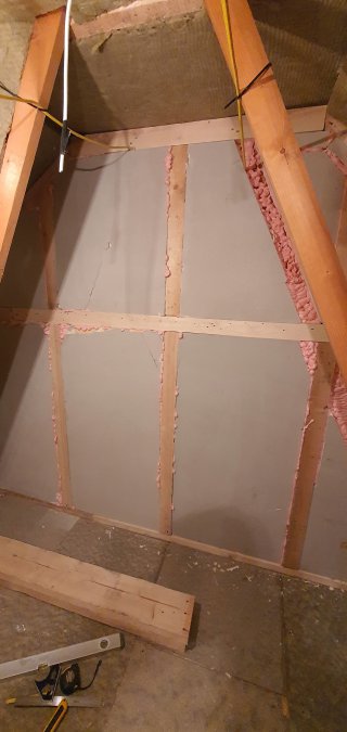 Shelf_wall_insulated_and_foamed_insulation_lego_room_build_day_8_mar_2021