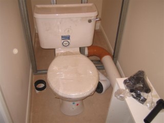 Cabling and Fitting the Toilet.