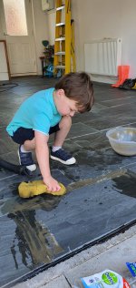 Ethan Grouting Fixing Broken Garage Floor Tile June 2020