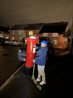 Ethan Posting Letter To Santa Dec 2025