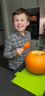 Ethan Scooping Orange Pumpkin Carving Oct 2021