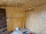 Expanding_foam_shed_insulation_and_boarding_oct_2025