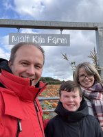 Rachel_ethan_and_i_sign_pumpkin_picking_oct_2026