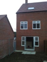 Sold Sign on New Townhouse Back