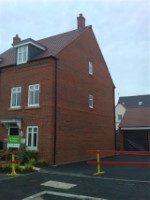 Sold Sign on New Townhouse Front